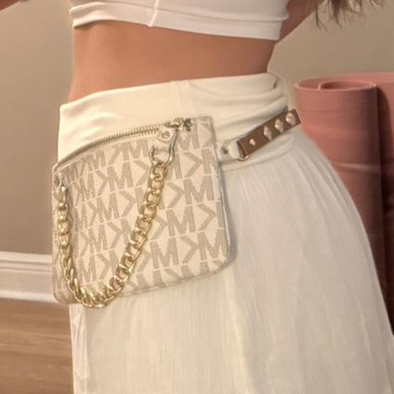 Michael Kors monogram bag with gold chain and adjustable strap; faux leather belt bag with pull chain.