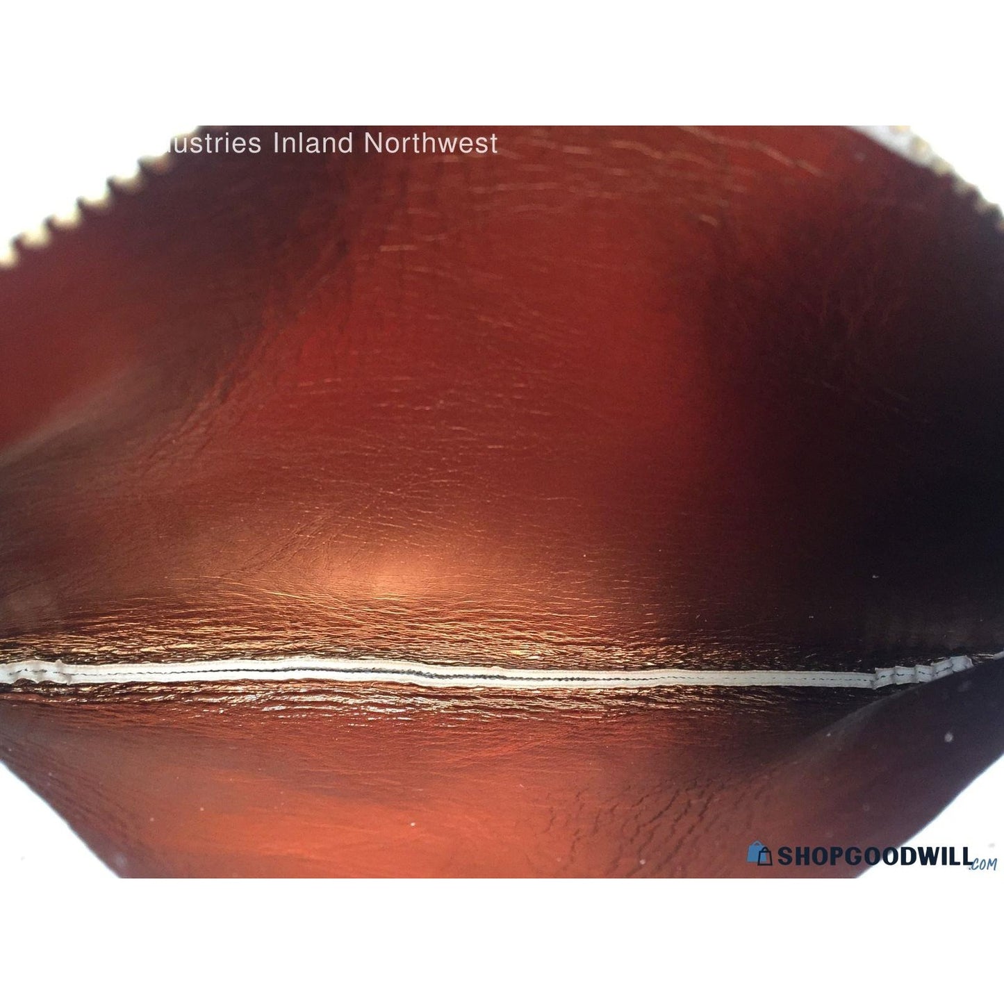 Michael Kors monogram bag with gold chain and adjustable strap; faux leather belt bag with pull chain.